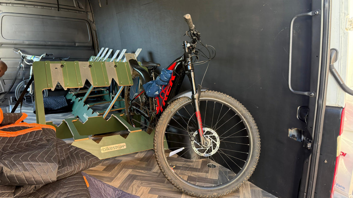 E-bike next to the bike racks inside a Cycle Courier Co. van